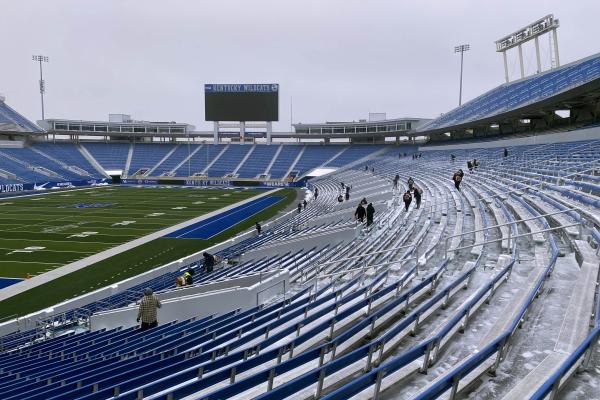 UK Grounds workers clear Kroger Field of snow and ice