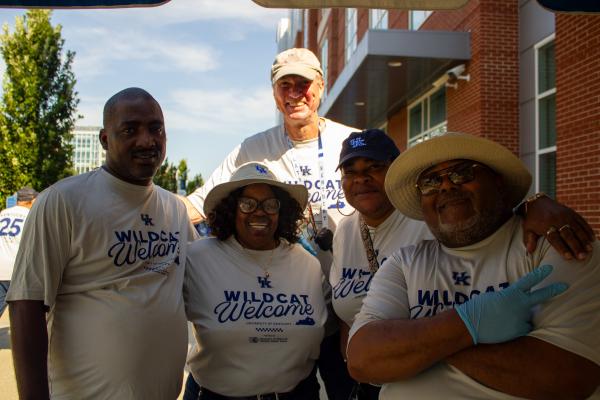 Facilities Management employees pose during move in
