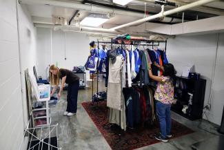 University of Kentucky students browsing through items at The Thrifty Cat.