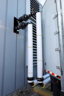 Photo of piping going into a building