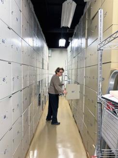 FIS employee in the archives
