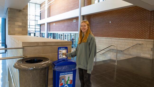 UK Student recycling in the Gatton Student Center