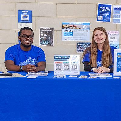 University of Kentucky students tabling outside of the Fresh Food Company in The 90.