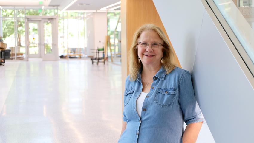 Sandy Redmon standing in Scovell Hall